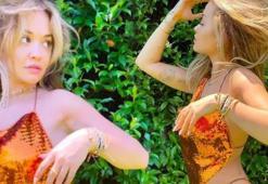 Rita Ora güneş banyosu yaptı! Çimlere uzanıp...