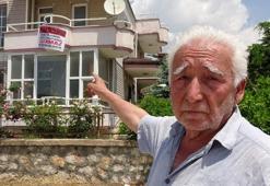 Villaya astığı pankart dikkat çekti