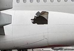 Havada panik! Uçak, 14 saat yan tarafındaki delikle uçtu