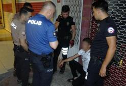 Eşiyle alışveriş yapan kadına laf atınca meydan dayağı yedi