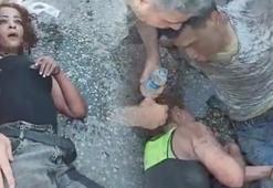 Tur otobüsü altında kaçmaya çalışan göçmenler yanmaktan son anda kurtuldu