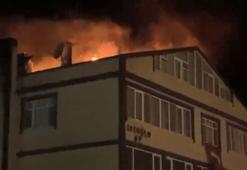 Arnavutköy'de bina sakinleri çatıya çıkıp yangına müdahale etti