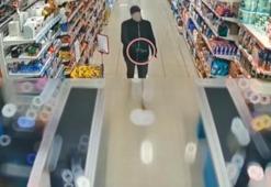 Bıçakla girdiği marketten kasadaki 6 bin 500 TL'yi aldı