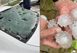 Ceviz büyüklüğünde dolu yağdı! Araçların camları patladı