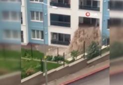 Başkent'te su basan dairenin eşyaları dışarı taştı