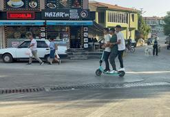 Tehlikeli yolculuk: Bir scooterde 3 kişi
