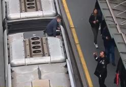 Video çekmek için metrobüsün üzerine çıkan fenomen güvenliklere yakalandı