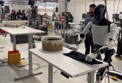 Elon Musk, Tesla'nın insansı robotun tişört katladığı anları paylaştı