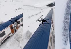 Snowboardla Doğu Ekspresi’nin üzerinden atladı