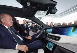 Cumhurbaşkanı Erdoğan, Togg’un yeni modeli T10F’in direksiyonunda