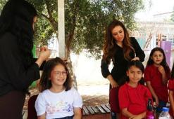 Gönüllü kuaförlerden okul bahçesinde ücretsiz tıraş! "Değerli hissetsinler istedik"