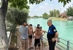 Adana’da polis sulama kanalına giren gençleri uyardı