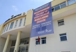 SGK’ya borçlarını ödediklerini dev pankartla duyurdular! Adana'nın örnek belediyesi