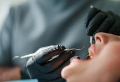 Sahte doktora tazminat cezası! Muayenehaneye gelen hastanın 4 dişini çekmişti