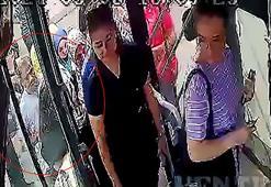 Otobüse binen kadının çantasındaki cep telefonunu saniyeler içinde çaldı