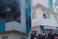 Şanlıurfa'da korku dolu anlar! Yangında balkonda mahsur kalan genç kız ve çocuk battaniyeye atlayarak kurtuldu