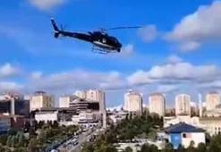 Penceresinin önünde helikopter gördü! O anlar kamerada