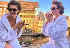 Burcu Özberk bornozu giydi balkona çıktı! Fransa'dan poz verdi