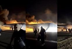 Antalya'da alev alev yanan sabıkalı uçaktan tahliye anı kameralara an be an yansıdı