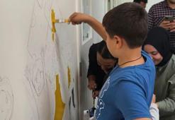 11 yaşındaki otizmli Ömür Kaan engelleri resim ile aşıyor