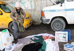 18 yıl önce kızının eve getirdiği yavru kedi hayatını değiştirdi: Sokaktaki canlar için ikinci el eşya satıyor