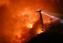 ABD'deki yangınlar devam ediyor: Mahkumlar yangın söndürme çalışmalarına yardım ediyor