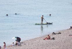 Kış ortasında sahil keyfi! Deniz kenarı doldu taştı