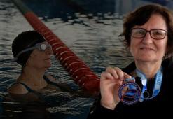 Sudan korkan 68 yaşındaki ev hanımı, şimdi ödüllü yüzücü oldu!