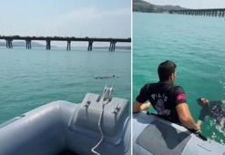 Adana'da baraj gölüne düşen kadını gemi adamlar kurtardı