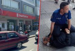 Eskişehir'de elinde tüfekle bankaya giren şüpheli: 'borcum çok var, bana para verin' dedi! Gözaltına alındı