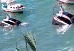 Arabasıyla deniz uçtu: Balıkesir'de otomobilin tavanına oturup yardım bekledi