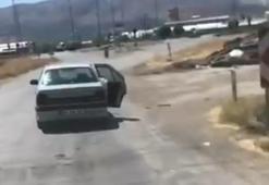 Erzincan’da açık kapılı araçla riskli yolculuk kameralara yansıdı
