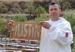 Erzurumlu bal üreticisinden örnek davranış! Bal mumuyla şekil verdiği peteklere yazı yazdı