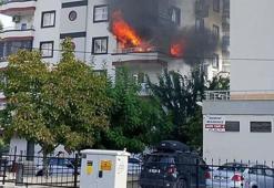 Mersin Yenişehir'de 9 katlı binada yangın: Alevler daireyi sardı