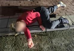 Aksaray’da kaldırıma yatıp çığlık attı, polisi görünce kaçmak istedi