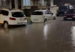 İnegöl’de sağanak hayatı felç etti! Cadde ve sokaklar göle döndü, aracına sandalyeyle böyle bindi