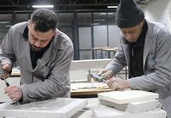 Kayseri'de baba-oğul 119 yıllık Sion Yetimhanesi'nin bahçesinde taşa şekil veriyor!