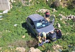 Defne'de uçurumdan yuvarlanan otomobil sürücüsü yaralandı