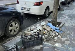 Binanın dış yüzeyinden düşen parçalar panik yarattı: Deprem oluyor zannettik