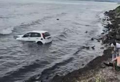 Kuşadası’nda otomobilin denize uçtuğu kazada bir kişi yaralandı