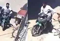 Sokak ortasında 7 yaşındaki kızına defalarca tokat atıp, saçından sürükledi; o anlar kamerada