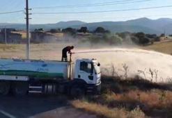 Kütahya'da arazi yangını korkuttu: Bir itfaiye eri dumandan etkilendi