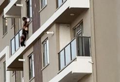 7. katın balkonunda korku dolu anlar: Baş aşağı asılı böyle yakalandı