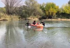 Dicle Nehri kenarında piknik yapan 2 kişi suların yükselmesiyle mahsur kaldı