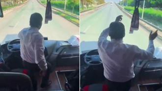 Antalya'da taraftarları deplasmana götüren şoför araç seyir halindeyken ayağa kalkıp oynadı