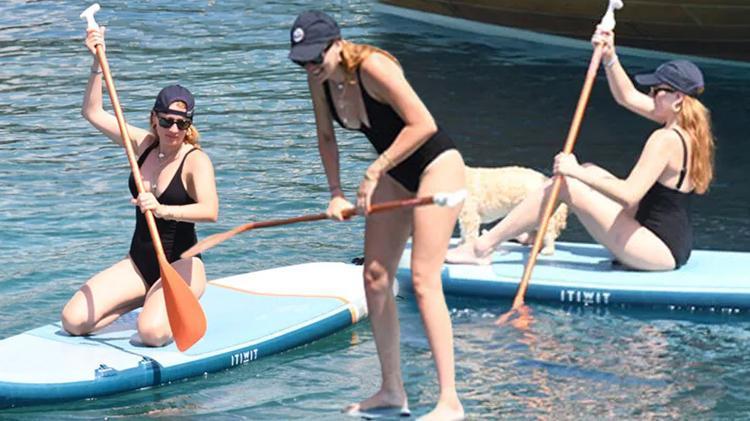 Gizem Karaca tekne tatilinde Sörf tahtasıyla keyif yaptı