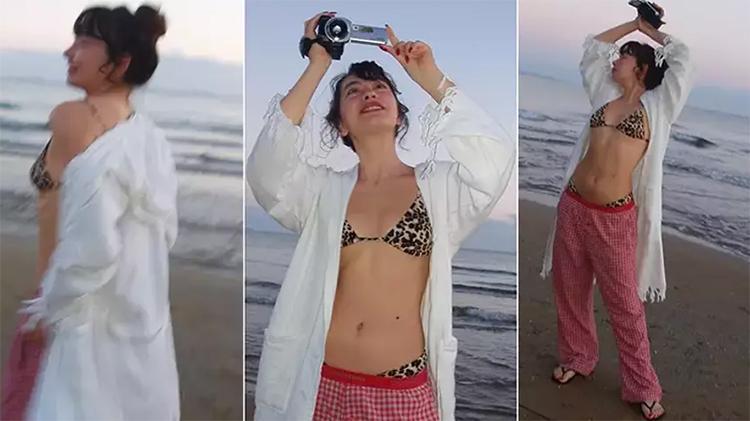 Neslihan Atagül sabah 05.00te bikinisini giyip sahile indi, resmen yorum yağdı