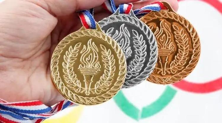 Olimpiyatlarda madalya kazanan sporculara ülkelerin verdiği ödüller Altın madalyaya ev veren ülke de var, ömür boyu maaşa bağlayan da