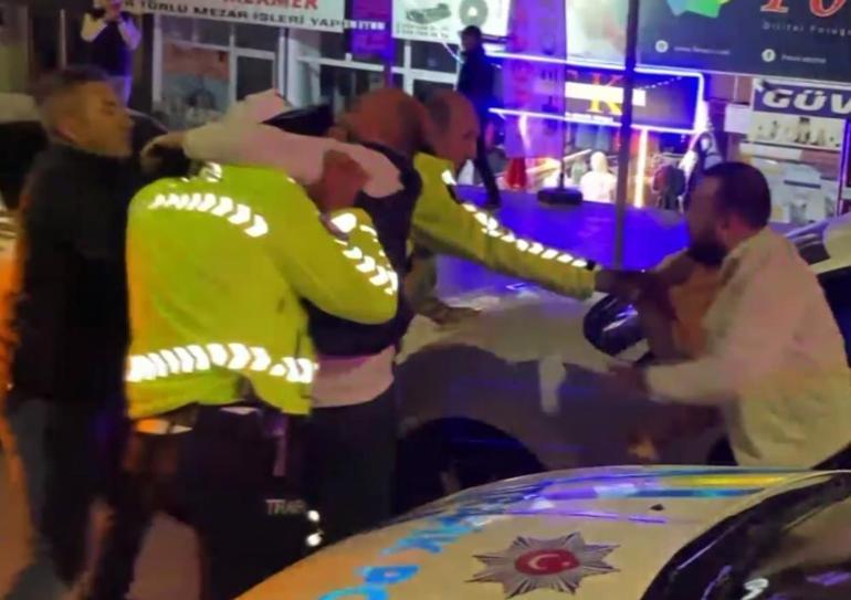 Alkollü sürücü ve yakınları polise yumrukla saldırdı
