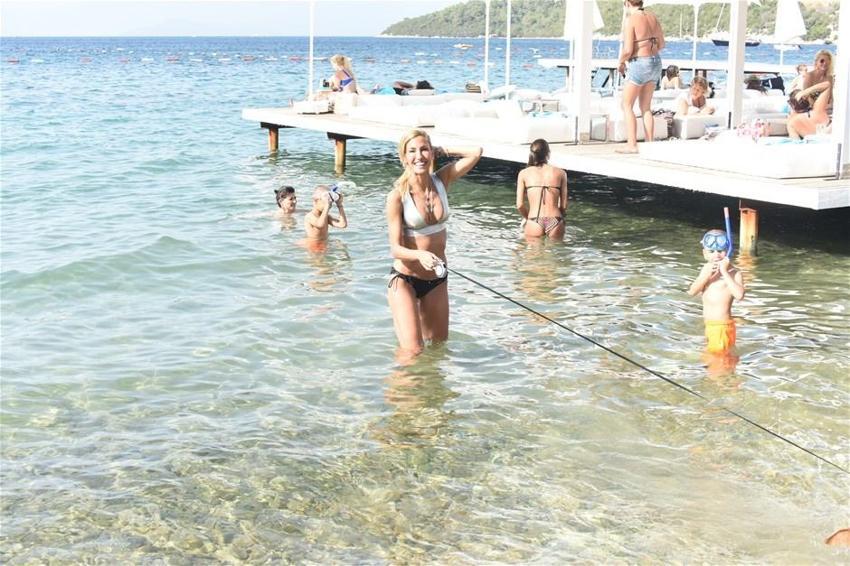 Kim der iki çocuk annesi!